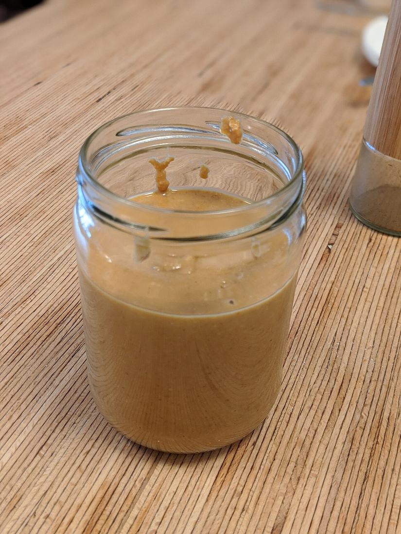 A glass jar of peanut butter, CC BY 4.0